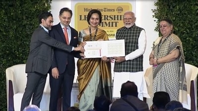 Prime Minister Narendra Modi with Shobhana Bhartia, chairperson and editorial director of HT Media Ltd, on Saturday.