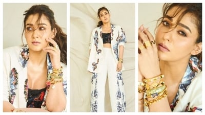 Nayanthara wore a printed suit with black crop top with fine beadwork while the blazer and pants featured the same green and red accent. The look captures an artsy, boho aesthetic yet keeping the soft feminine energy fierce with her boss-lady poise. (Instagram/@tanghavri) Nayanthara wore a printed suit with black crop top with fine beadwork while the blazer and pants featured the same green and red accent. The look captures an artsy, boho aesthetic yet keeping the soft feminine energy fierce with her boss-lady poise. (Instagram/@tanghavri)