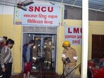 Firefighters work after a fire broke out in a neonatal intensive care unit at Jhansi Medical College hospital in Jhansi (AP)(HT_PRINT)