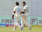 India's Virat Kohli, right, and Rishabh Pant walks towards pavilion after a match.