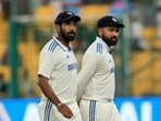 India's captain Rohit Sharma, right, and Jasprit Bumrah leave the field India's captain Rohit Sharma, right, and Jasprit Bumrah leave the field