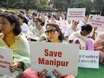 People take part in a protest orgainsed by Delhi Meetei Co-ordinating Committee over recent violence in Manipur, at Jantar Mantar in Delhi on Sunday. (Sanjeev Verma/HT Photo) People take part in a protest orgainsed by Delhi Meetei Co-ordinating Committee over recent violence in Manipur, at Jantar Mantar in Delhi on Sunday. (Sanjeev Verma/HT Photo)