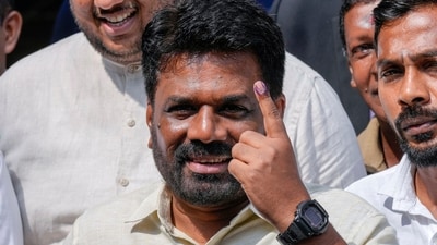 Sri Lankan President Anura Kumara Dissanayake shows his finger as he leaves after casting his vote during the parliamentary election in Colombo, Sri Lanka, Thursday, Nov. 14, 2024. (AP) Sri Lankan President Anura Kumara Dissanayake shows his finger as he leaves after casting his vote during the parliamentary election in Colombo, Sri Lanka, Thursday, Nov. 14, 2024. (AP)