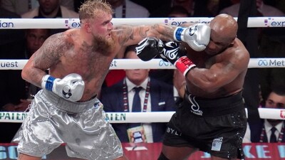 Jake Paul lands a left to Mike Tyson during their heavyweight boxing match, Friday, Nov. 15, 2024, in Arlington, Texas. AP/PTI(AP11_16_2024_000188A) (AP) Jake Paul lands a left to Mike Tyson during their heavyweight boxing match, Friday, Nov. 15, 2024, in Arlington, Texas. AP/PTI(AP11_16_2024_000188A) (AP)