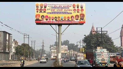 An illegal hoardings near the grain market of Janta Nagar in Ludhiana on Sunday. (Manish/HT) An illegal hoardings near the grain market of Janta Nagar in Ludhiana on Sunday. (Manish/HT)