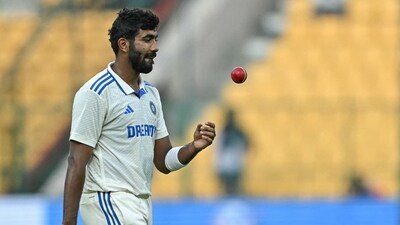 India's Jasprit Bumrah gestures as he bowls during the second day of the first Test cricket match between India and New Zealand (AFP) India's Jasprit Bumrah gestures as he bowls during the second day of the first Test cricket match between India and New Zealand (AFP)