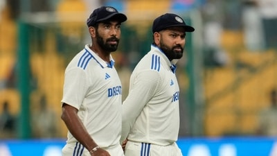 India's captain Rohit Sharma, right, and Jasprit Bumrah leave the field (AP) India's captain Rohit Sharma, right, and Jasprit Bumrah leave the field (AP)