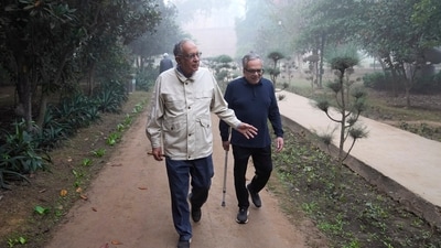 Rajiv Sikri, left, and Subodh Jain take a morning walk in Lodhi Gardens in New Delhi, India, Friday, Nov. 15, 2024. (AP Photo/Manish Swarup) (AP) Rajiv Sikri, left, and Subodh Jain take a morning walk in Lodhi Gardens in New Delhi, India, Friday, Nov. 15, 2024. (AP Photo/Manish Swarup) (AP)