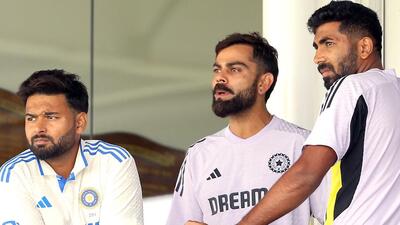 India players Virat Kohli (C), Rishabah Pant (L) and Jasprit Bumrah watch the internal practice match in Perth. (AFP) India players Virat Kohli (C), Rishabah Pant (L) and Jasprit Bumrah watch the internal practice match in Perth. (AFP)