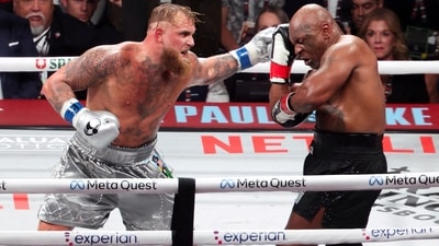 Mike Tyson (black gloves) fights Jake Paul (silver gloves) at AT&T Stadium. (Kevin Jairaj-Imagn Images)