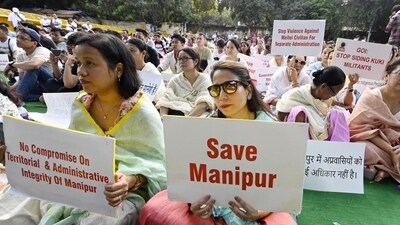 People take part in a protest orgainsed by Delhi Meetei Co-ordinating Committee over recent violence in Manipur, at Jantar Mantar in Delhi on Sunday. (Sanjeev Verma/HT Photo)