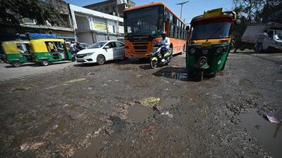 Potholes and debris on Rohtak Road near Anand Parbat in New Delhi on Monday. (Sanchit Khanna/HT Photo) Potholes and debris on Rohtak Road near Anand Parbat in New Delhi on Monday. (Sanchit Khanna/HT Photo)