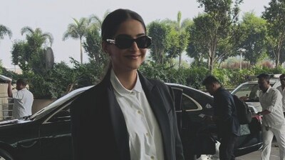 Sonam Kapoor stuns in a maxi shirt-dress and wool coat ensemble, going with high-end brands head to toe. (PC: Ashutosh Rai) Sonam Kapoor stuns in a maxi shirt-dress and wool coat ensemble, going with high-end brands head to toe. (PC: Ashutosh Rai)
