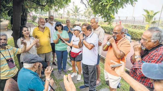 Mumbai, India - Nov. 17, 2024: A small group of harmonica enthusiasts called Mumbai Harmonics came to Bandra Joggers Park to play for singing and dancing and had a lot of fun in Mumbai, India, on Sunday, November 17, 2024. (Photo by Satish Bate/ Hindustan Times) (Hindustan Times)