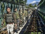 Assam Rifles officers at Lailophai in Churachandpur district of Manipiur on Monday. (PTI) Assam Rifles officers at Lailophai in Churachandpur district of Manipiur on Monday. (PTI)