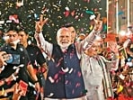 Prime Minister Narendra Modi flashes the victory sign as he arrives at the Bharatiya Janata Party (BJP) headquarters to celebrate the party’s win in general elections, on Tuesday. (AFP)