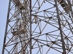 A 26-year-old man climbs a mobile tower in Kota district, threatening suicide over the alleged seizure of his tractor-trolley. (PTI File Photo) A 26-year-old man climbs a mobile tower in Kota district, threatening suicide over the alleged seizure of his tractor-trolley. (PTI File Photo)