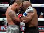 US YouTuber/boxer Jake Paul (L) and US retired pro-boxer Mike Tyson (R) hug at the end of their heavyweight boxing bout at The Pavilion at AT&T Stadium in Arlington, Texas, November 15, 2024. (Photo by TIMOTHY A. CLARY / AFP) US YouTuber/boxer Jake Paul (L) and US retired pro-boxer Mike Tyson (R) hug at the end of their heavyweight boxing bout at The Pavilion at AT&T Stadium in Arlington, Texas, November 15, 2024. (Photo by TIMOTHY A. CLARY / AFP)
