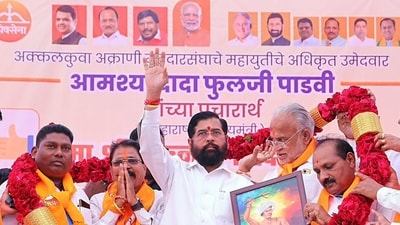 Maharashtra Chief Minister Eknath Shinde being garlanded during a public meeting for the state Assembly election in Nandurbar on Sunday. (ANI Photo) (Eknath Shinde X) Maharashtra Chief Minister Eknath Shinde being garlanded during a public meeting for the state Assembly election in Nandurbar on Sunday. (ANI Photo) (Eknath Shinde X)