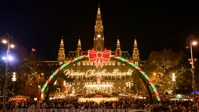 People look at the illuminations at the Wiener Chritkindlmarkt in front of Vienna's city hall, one of Vienna's most popular Christmas markets, in Vienna, Austria. (AP) People look at the illuminations at the Wiener Chritkindlmarkt in front of Vienna's city hall, one of Vienna's most popular Christmas markets, in Vienna, Austria. (AP)