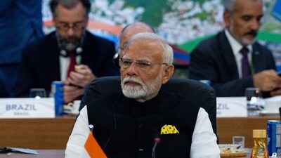 Indian's Prime Minister Narendra Modi, center, and other G20 leaders attend the G20 Summit at the Museum of Modern Art in Rio de Janeiro, Monday, Nov. 18, 2024. (AP/PTI Photo) Indian's Prime Minister Narendra Modi, center, and other G20 leaders attend the G20 Summit at the Museum of Modern Art in Rio de Janeiro, Monday, Nov. 18, 2024. (AP/PTI Photo)