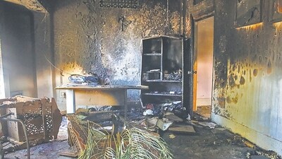 Charred remains of items at BJP leader and Manipur minister Govindas Konthoujam's residence, which was set on fire by some miscreants, at Ningthoukhong in Bishnupur district, on Monday. (PTI) Charred remains of items at BJP leader and Manipur minister Govindas Konthoujam's residence, which was set on fire by some miscreants, at Ningthoukhong in Bishnupur district, on Monday. (PTI)