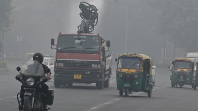 A vehicle sprays water onto the road near India Gate in New Delhi, India, as part of dust suppression measures during severe air pollution, on Monday, (RAJ K RAJ /HT PHOTO) A vehicle sprays water onto the road near India Gate in New Delhi, India, as part of dust suppression measures during severe air pollution, on Monday, (RAJ K RAJ /HT PHOTO)