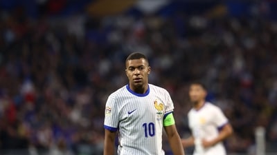 France's forward #10 Kylian Mbappe looks on during a match. (AFP) France's forward #10 Kylian Mbappe looks on during a match. (AFP)