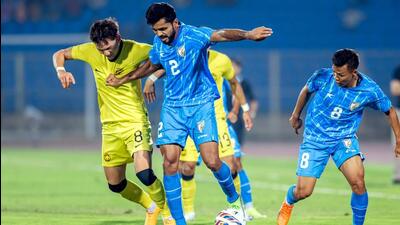 India and Malaysia players vie for the ball in their international football friendly in Hyderabad on Monday. (PTI) India and Malaysia players vie for the ball in their international football friendly in Hyderabad on Monday. (PTI)