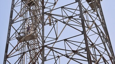 A 26-year-old man climbs a mobile tower in Kota district, threatening suicide over the alleged seizure of his tractor-trolley. (PTI File Photo) (PTI) A 26-year-old man climbs a mobile tower in Kota district, threatening suicide over the alleged seizure of his tractor-trolley. (PTI File Photo) (PTI)