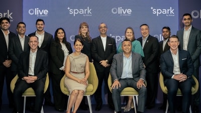 Hilton signs licensing agreement with Olive by Embassy to bring 150 Spark by Hilton Hotels to India. In front row (seated from L-R) Kahraman Yigit, Co-founder & CEO, Olive by Embassy, Shruti Gandhi Buckley, Hampton & Spark Global Brand Management, Hilton, Jitu Virwani, Chairman & Managing Director, Embassy Group and Alan Watts, President, Asia Pacific, Hilton.