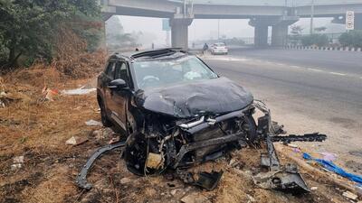 The wrecked car on NH-48 near Iffco chowk elevated U-turn in Gurugram on Monday morning. (Parveen Kumar/ HT Photo) The wrecked car on NH-48 near Iffco chowk elevated U-turn in Gurugram on Monday morning. (Parveen Kumar/ HT Photo)