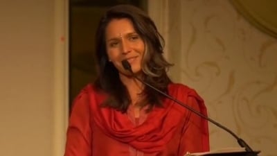 Tulsi Gabbard, who was the main speaker, can be seen singing the bhajan “Hare Krishna” in a viral video. (X) Tulsi Gabbard, who was the main speaker, can be seen singing the bhajan “Hare Krishna” in a viral video. (X)