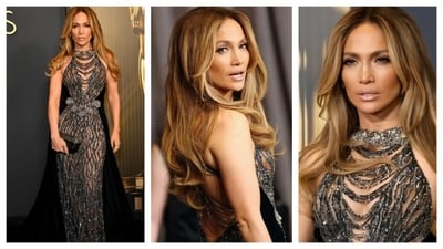 Jennifer Lopez as always looked like a fierce evening bombshell in a form-fitting, shimmery gown that had a semi-sheer fabric. It was adorned with sequins and beadwork. Her voluminous hair complemented her bombshell dress. (Instagram) Jennifer Lopez as always looked like a fierce evening bombshell in a form-fitting, shimmery gown that had a semi-sheer fabric. It was adorned with sequins and beadwork. Her voluminous hair complemented her bombshell dress. (Instagram)