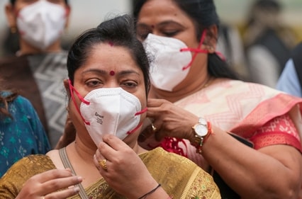 Use N95 mask or a pollution mask, when outdoors. (PTI) Use N95 mask or a pollution mask, when outdoors. (PTI)