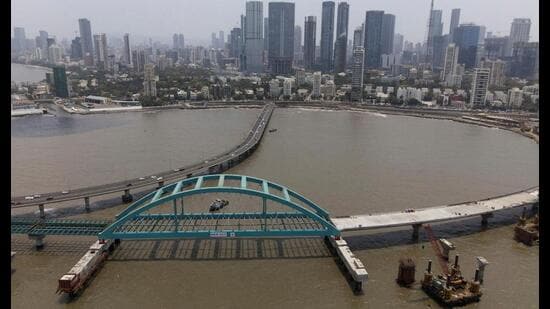 FILE PHOTO: FILE PHOTO: A drone view shows a bowstring arch bridge, installed by Hindustan Construction Company, that will connect the Bandra-Worli sea link and the coastal road in Mumbai, India, April 26, 2024. REUTERS/Francis Mascarenhas/File Photo/File Photo (REUTERS)