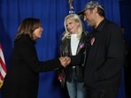 Democratic presidential nominee Vice President Kamala Harris greets Lady Gaga and her fiancé Michael Polansky at a campaign rally in Philadelphia, November 4, 2024, (AP Photo/Jacquelyn Martin)