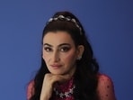  In this look, Shalini Passi dazzles in a magenta dress from Jenny Packham with sheer cape sleeves, exuding timeless grace 