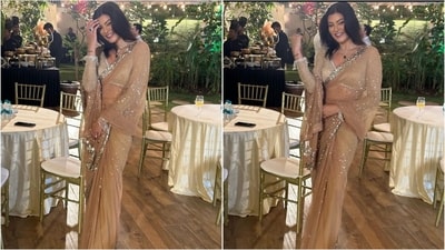 Sushmita Sen stunned in a golden netted saree featuring shimmering borders, paired with a full-sleeved V-neckline netted blouse that exuded glitter and glamour. (Instagram) Sushmita Sen stunned in a golden netted saree featuring shimmering borders, paired with a full-sleeved V-neckline netted blouse that exuded glitter and glamour. (Instagram)