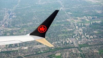An Air Canada plane is seen in the air after departing from Pearson International Airport in Toronto, Ontario, Canada. (REUTERS) An Air Canada plane is seen in the air after departing from Pearson International Airport in Toronto, Ontario, Canada. (REUTERS)