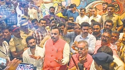 BJP leader Vinod Tawde tries to explain the case to the media after BVA workers gheraoed him for allegedly distributing cash to influence voters a day before Maharashtra Assembly polls at a hotel in Virar near Mumbai on Tuesday. (PTI) BJP leader Vinod Tawde tries to explain the case to the media after BVA workers gheraoed him for allegedly distributing cash to influence voters a day before Maharashtra Assembly polls at a hotel in Virar near Mumbai on Tuesday. (PTI)