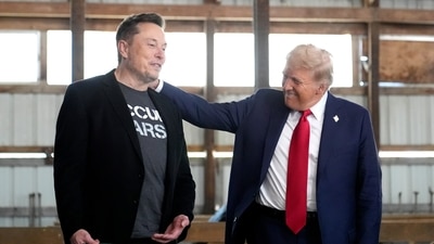 FILE - Tesla and SpaceX CEO Elon Musk, left, and President-elect Donald Trump attend a campaign event at the Butler Farm Show on Oct. 5, 2024, in Butler, Pa. (AP Photo/Alex Brandon, File) (AP) FILE - Tesla and SpaceX CEO Elon Musk, left, and President-elect Donald Trump attend a campaign event at the Butler Farm Show on Oct. 5, 2024, in Butler, Pa. (AP Photo/Alex Brandon, File) (AP)