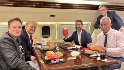 Donald Trump, Elon Musk, Donald Trump Jr, and RFK Jr posed with McDonald's meals onboard Trump Force One Saturday night as Speaker Mike Johnson smiles behind them. (X) Donald Trump, Elon Musk, Donald Trump Jr, and RFK Jr posed with McDonald's meals onboard Trump Force One Saturday night as Speaker Mike Johnson smiles behind them. (X)