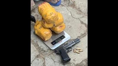 Police on Tuesday busted a trans-border narco smuggling and arms cartel in three operations and apprehended five persons from whom three Glock pistols, a .32 bore pistol & 3.97kg heroin were recovered. (HT File)