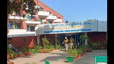 Police personnel at the hostel on the Panjab University campus in Chandigarh. (Ravi Kumar/HT)