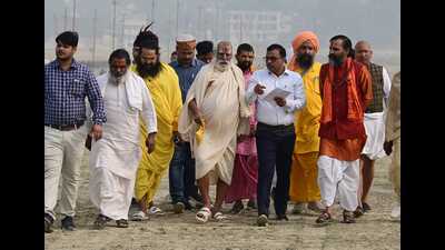 Saints in mela area near Sangam during the land allocation process for setting up of their camps ahead of the Mahakumbh in Prayagraj. (HT Photo) Saints in mela area near Sangam during the land allocation process for setting up of their camps ahead of the Mahakumbh in Prayagraj. (HT Photo)