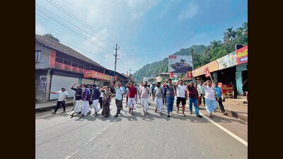 Supporters of the CPM take part in a demonstration in Wayanad on Tuesday. (HT Photo) Supporters of the CPM take part in a demonstration in Wayanad on Tuesday. (HT Photo)