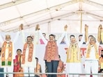 Dhule [Maharashtra], Nov 08 (ANI): Prime Minister Narendra Modi along with Maharashtra Dy CM Devendra Fadnavis, Bharatiya Janata Party (BJP) Dhule seat candidate Anup Agarwal and others hold hands during a public meeting for the Maharashtra Assembly elections, in Dhule on Friday. (ANI Photo) (Narendra Modi Website)