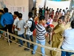 Voters stand in queues to cast their ballots to vote at a polling booth, during the Maharashtra state assembly elections. Voters stand in queues to cast their ballots to vote at a polling booth, during the Maharashtra state assembly elections.