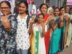 Thane: Women wait in a queue to cast votes at a polling station during the Maharashtra Assembly elections, in Thane, Wednesday, Nov. 20, 2024. (PTI Photo) (PTI11_20_2024_000186B)